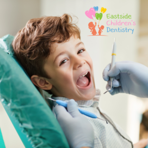 Young kid smiling in dentist chair